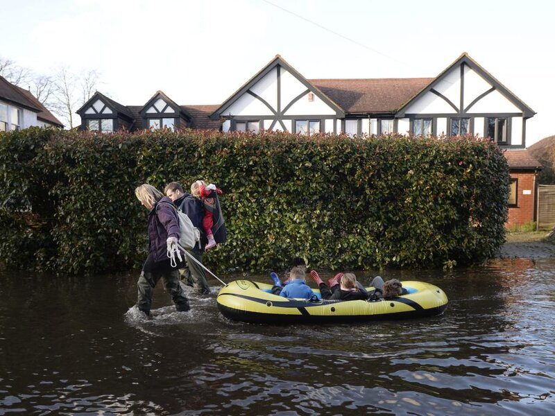 Family in Flooded Street