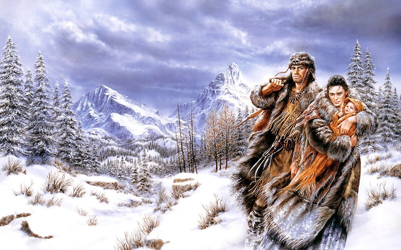 Family in snowy mountain landscape