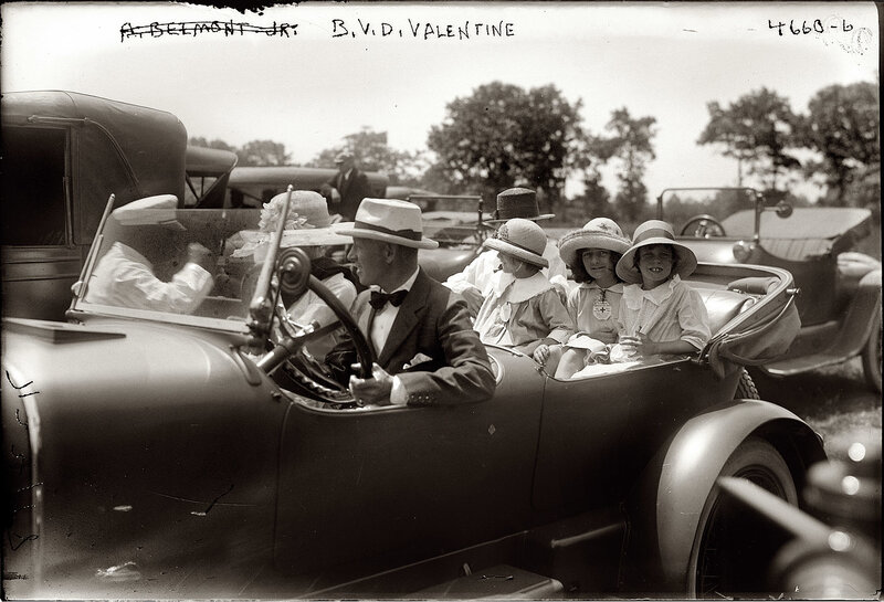 Family in vintage car