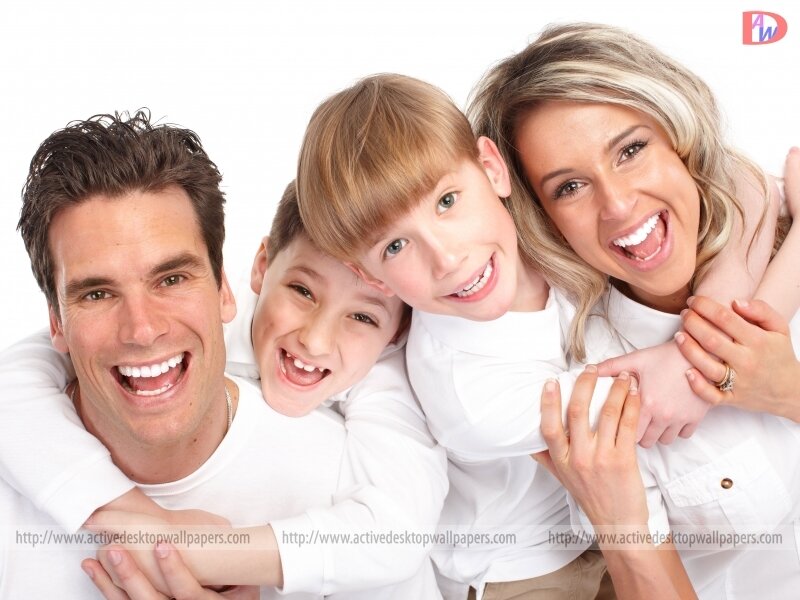 Family of Four Smiling