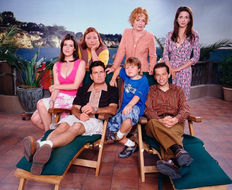 Family on Patio Chairs