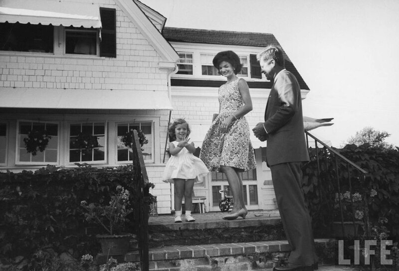 Family on porch steps