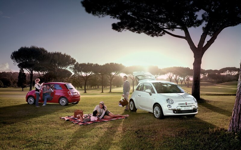 Family picnic with Fiat cars