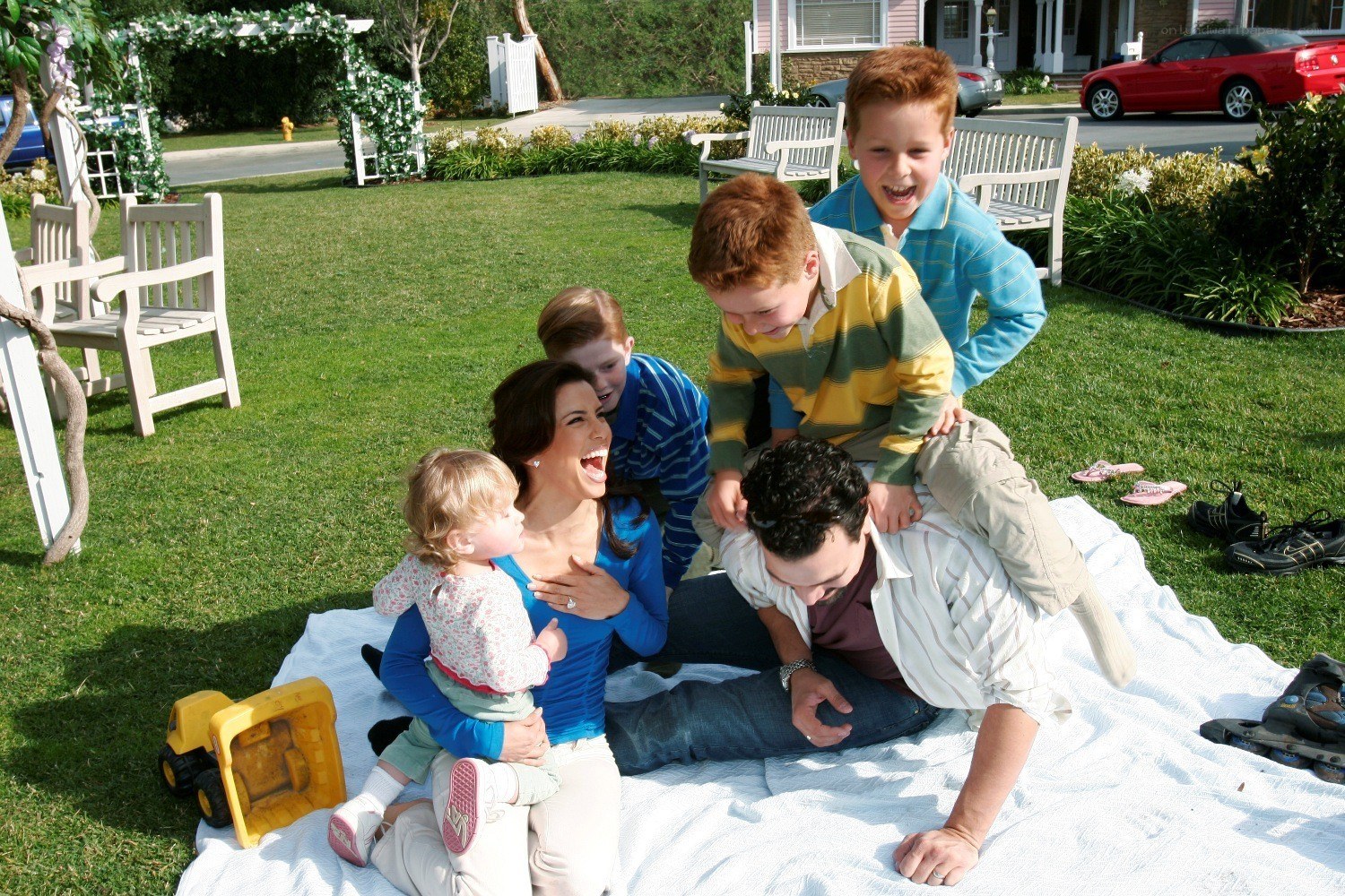 Family playing in backyard
