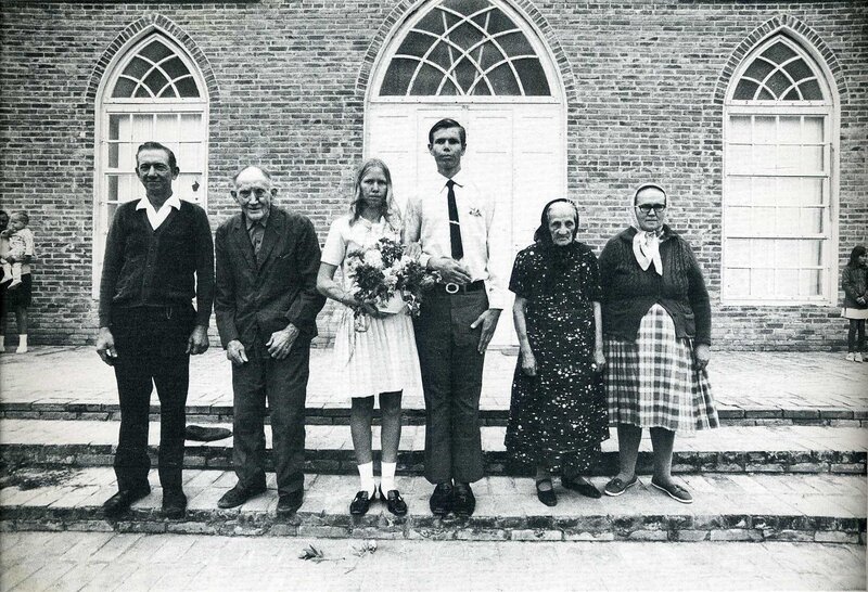 Family portrait in front of church