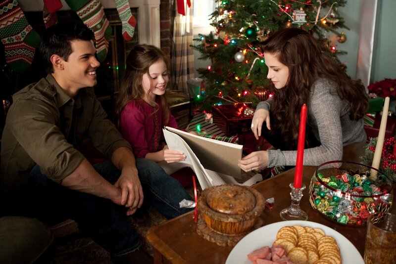Family Reading by Christmas Tree