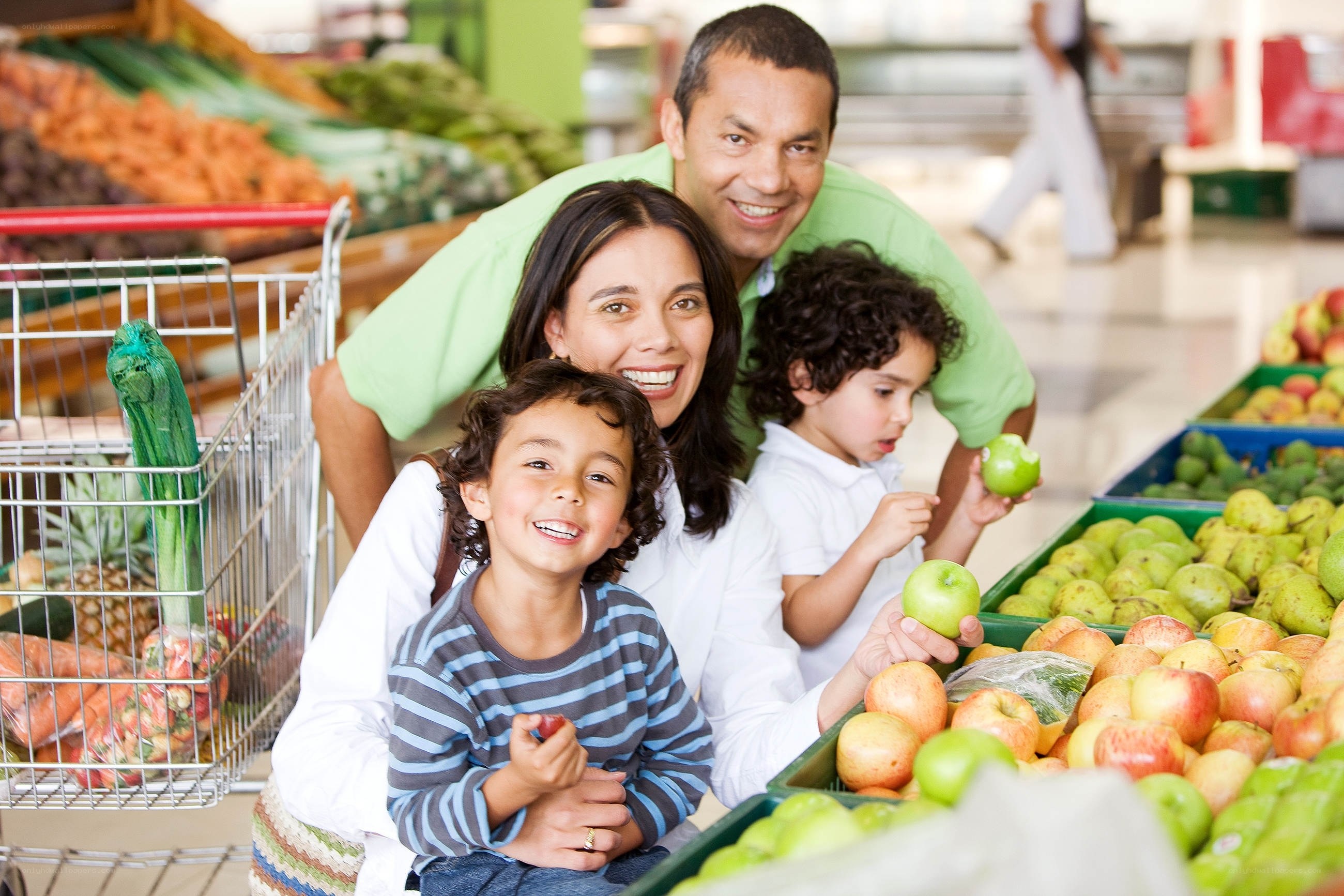 Family shopping for produce