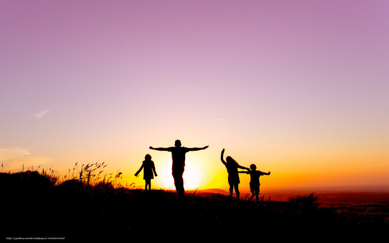 Family Silhouette at Sunset