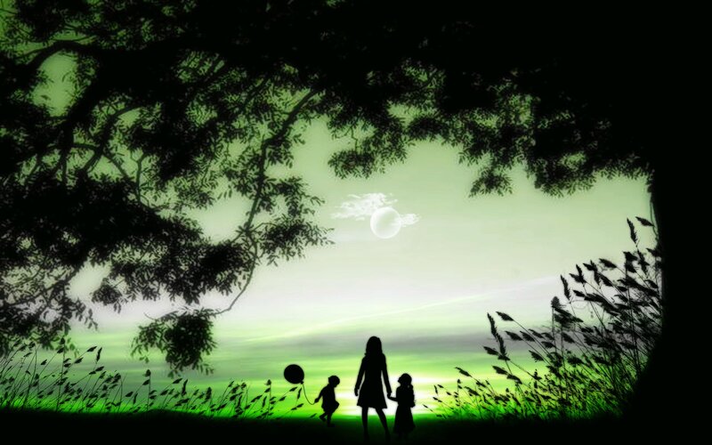 Family silhouette at sunset