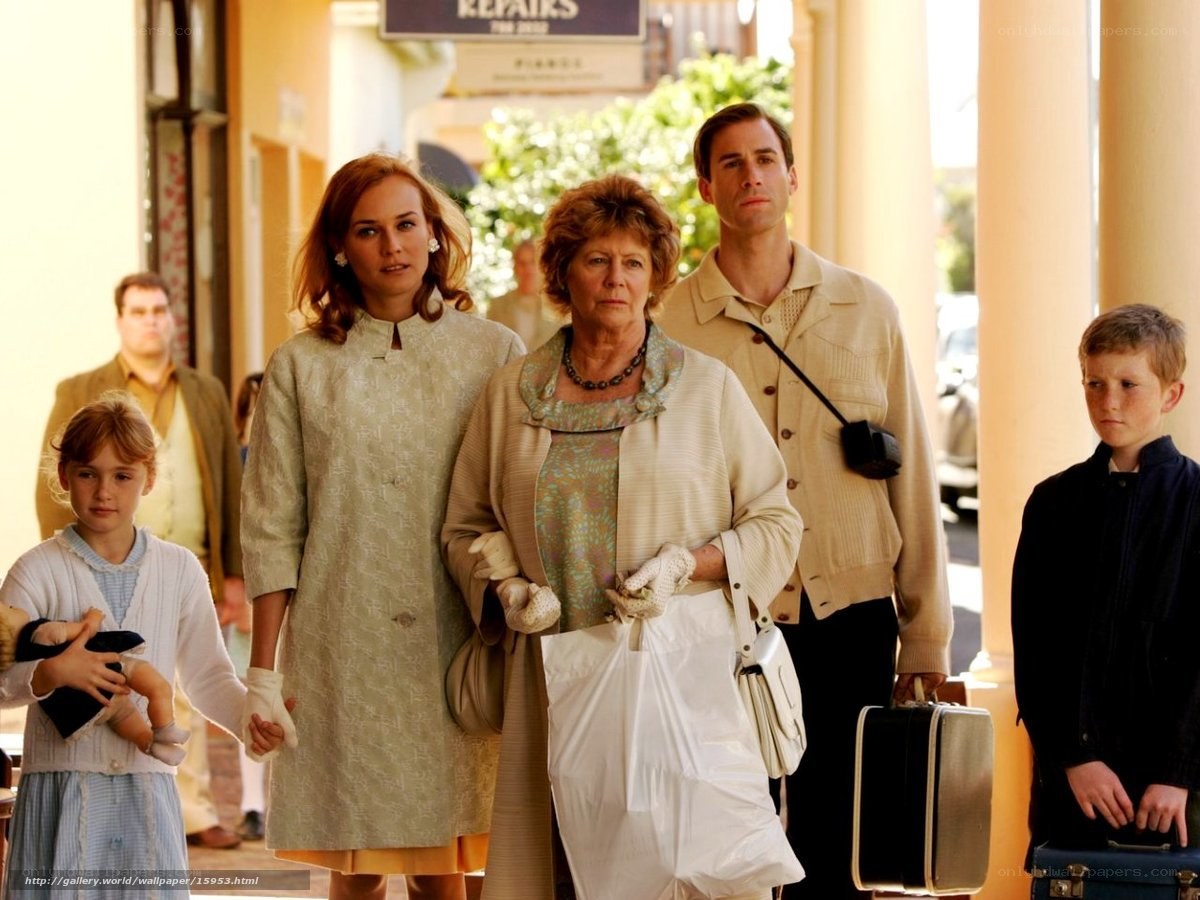 Family walking down street