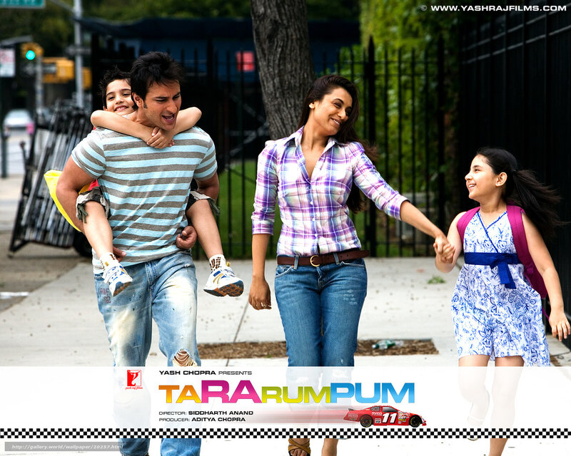 Family walking on sidewalk