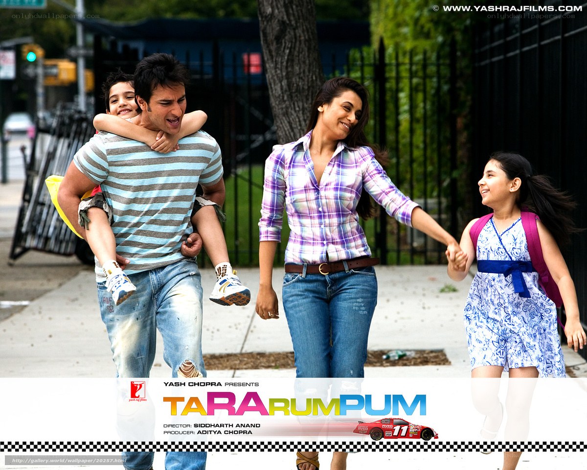 Family walking on sidewalk
