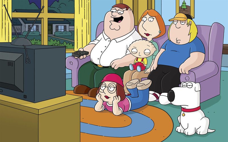 Family Watching TV — Purple, Relaxed
