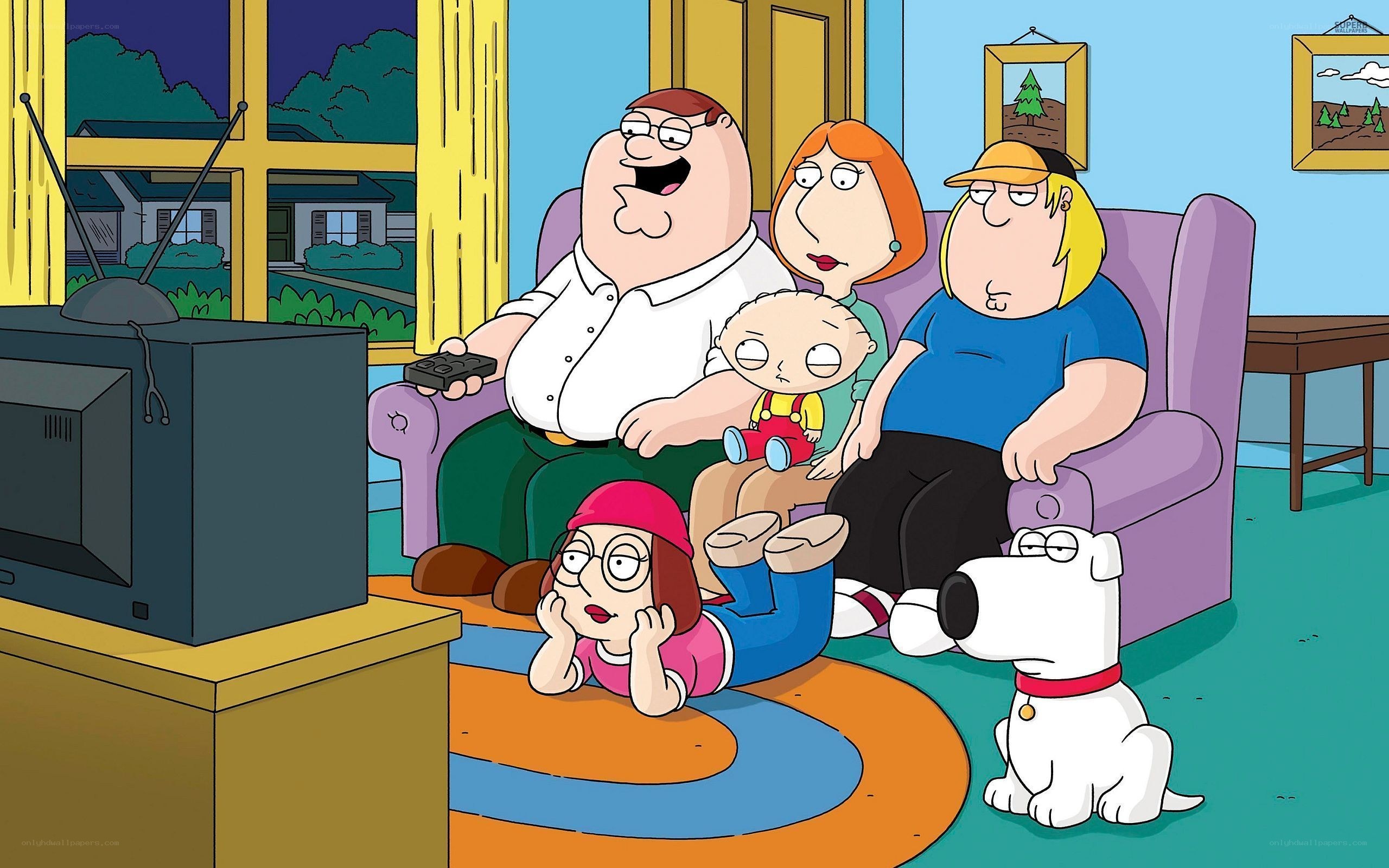 Family watching TV together