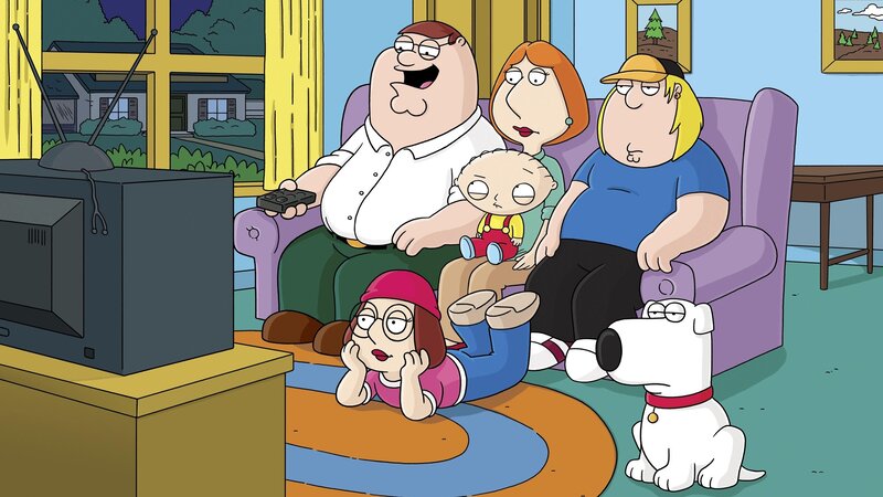 Family watching TV together