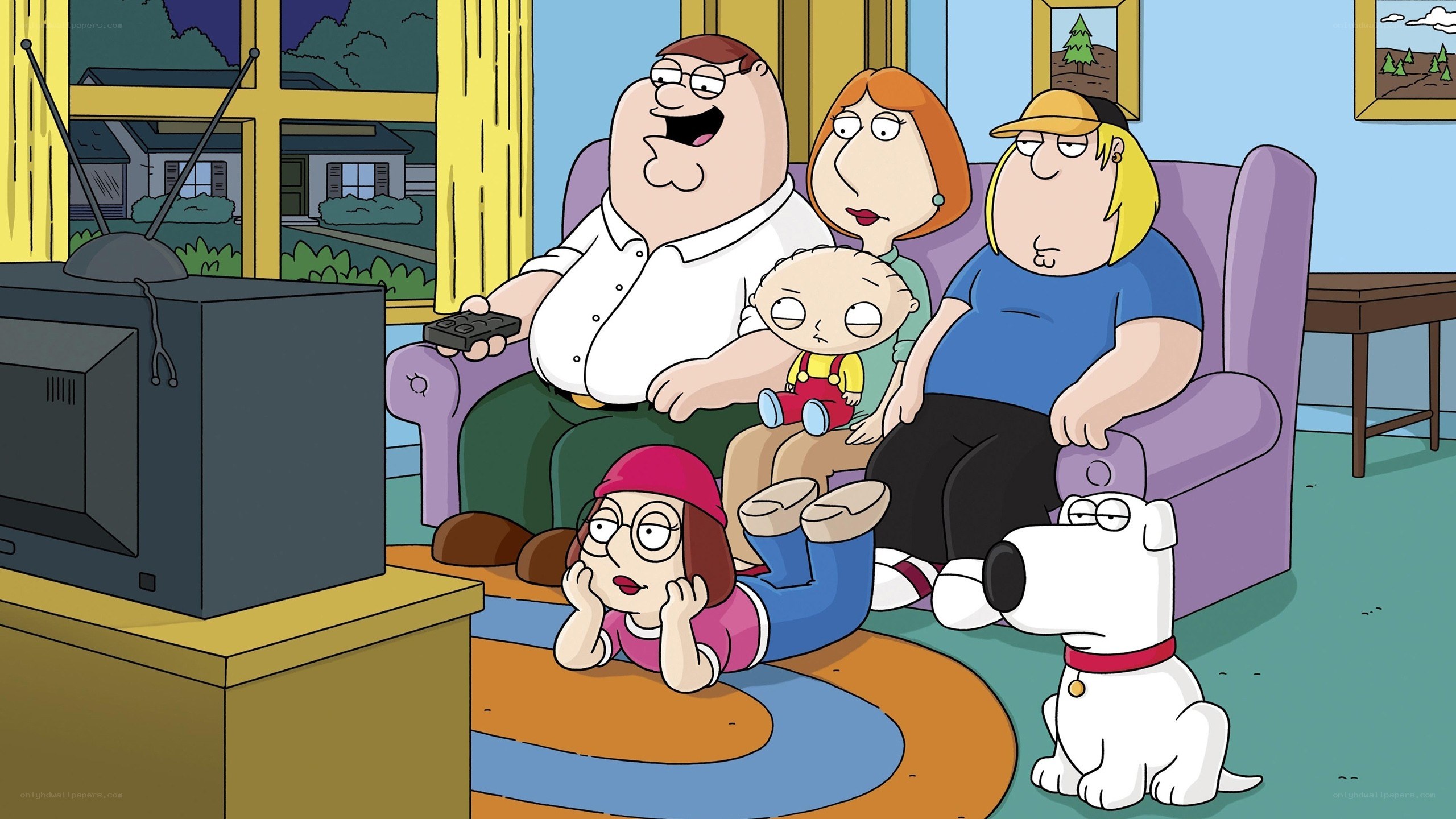 Family watching TV together