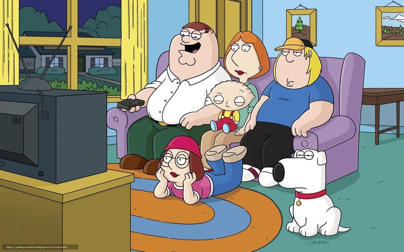 Family watching TV together