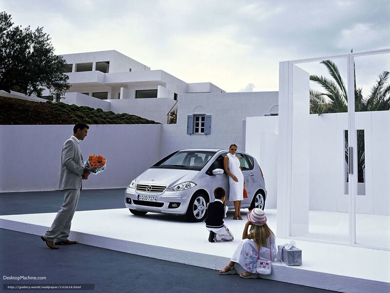 Family with car at modern home