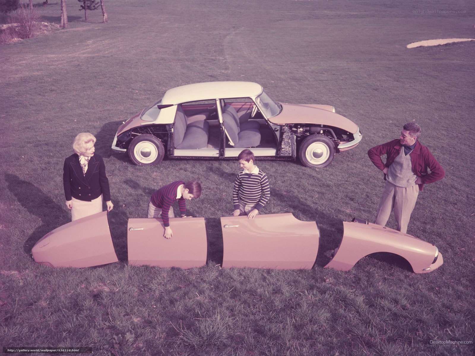 Family with disassembled car