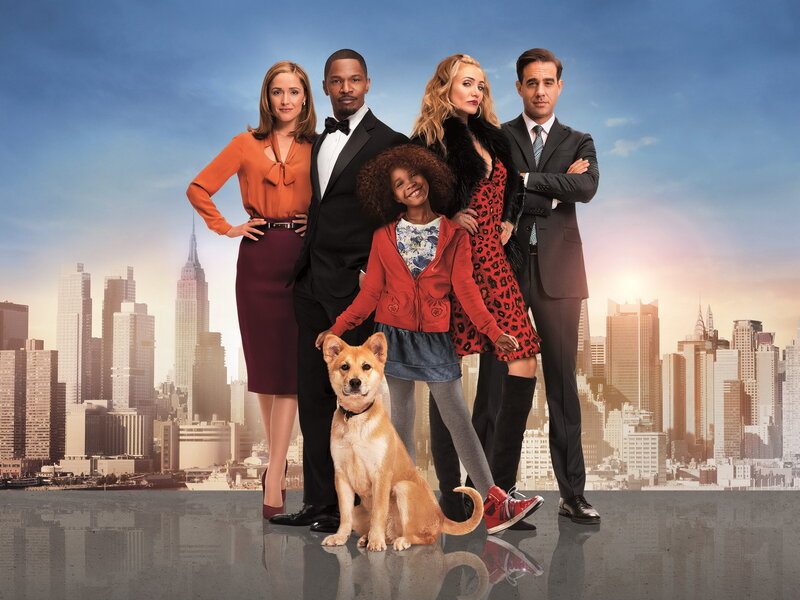 family with dog in city