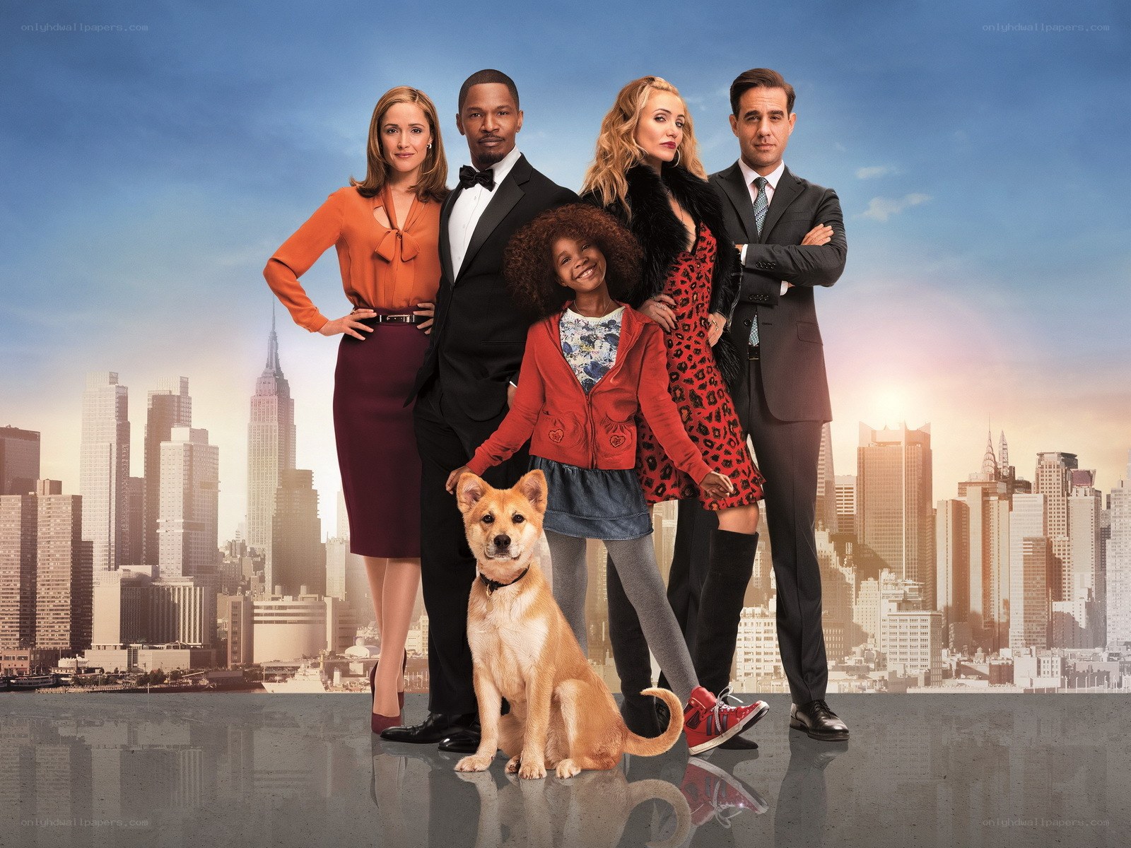 family with dog in city