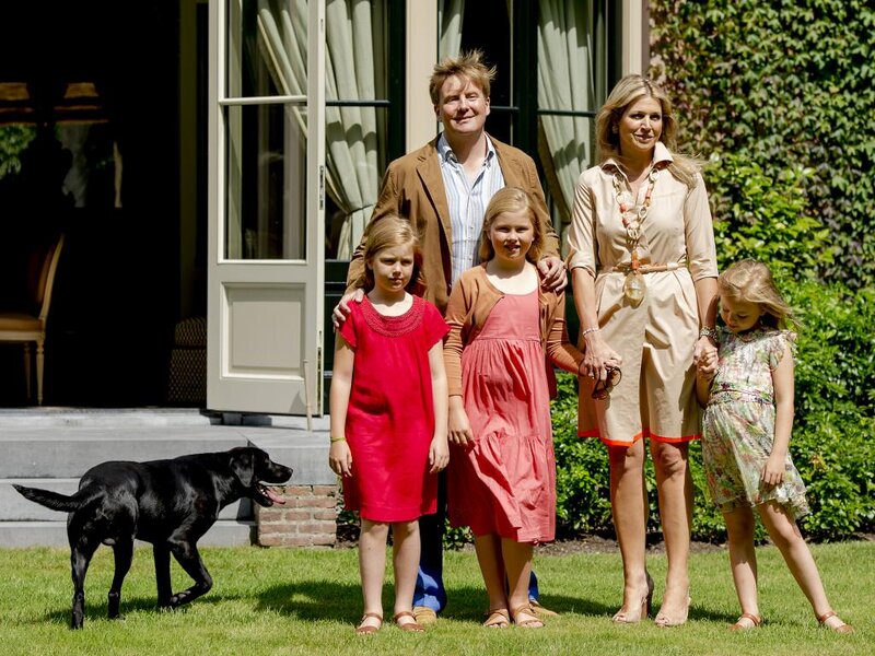 Family with Dog on Lawn