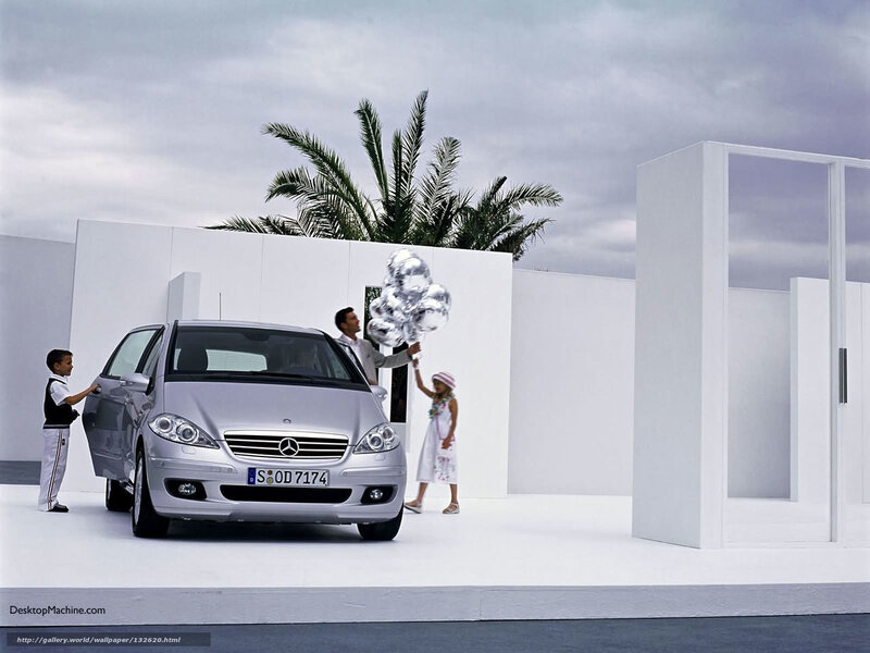 Family with Mercedes-Benz car