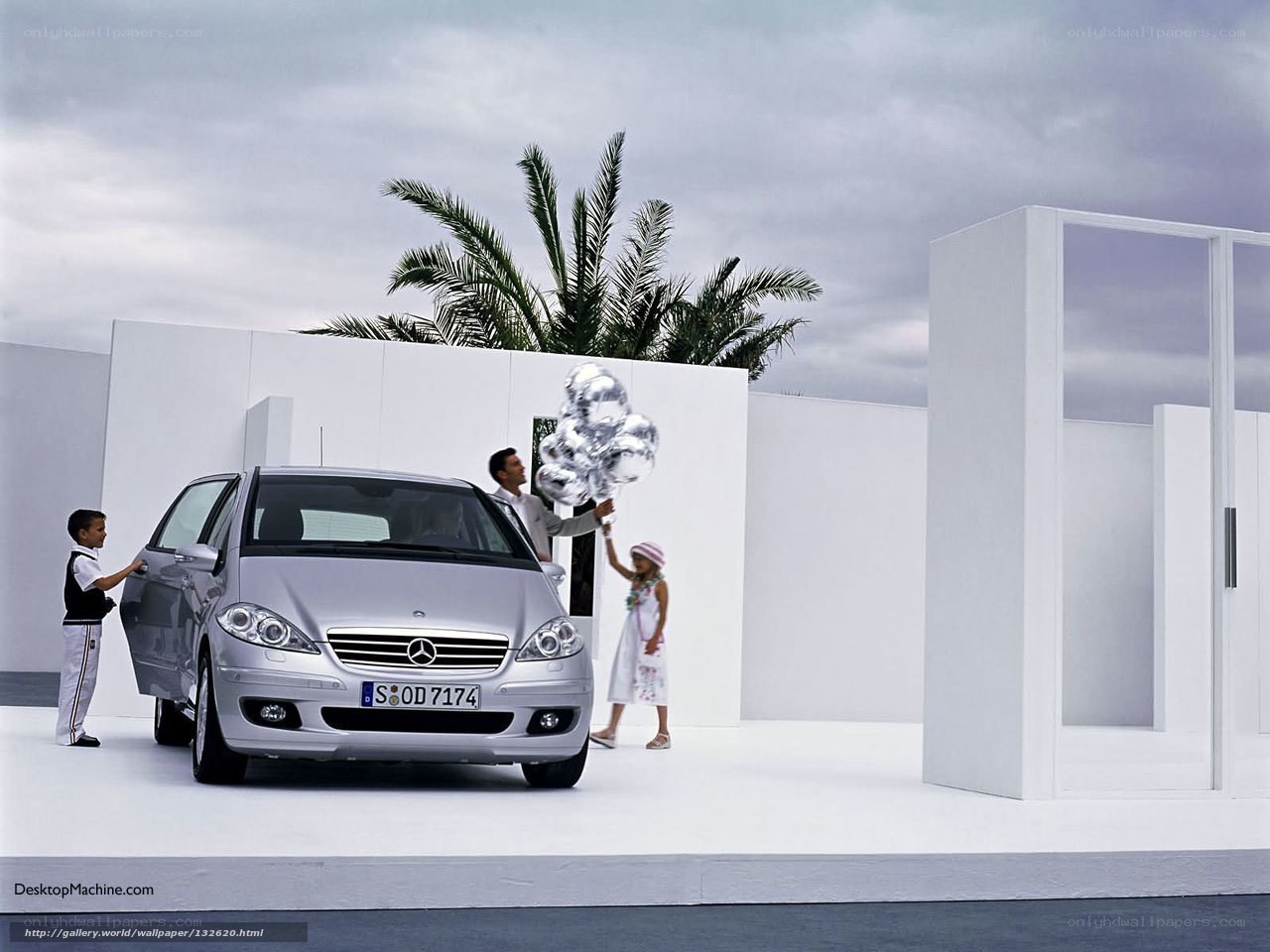 Family with Mercedes-Benz car