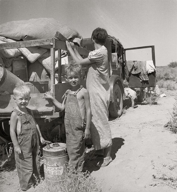 Family with truck in desert