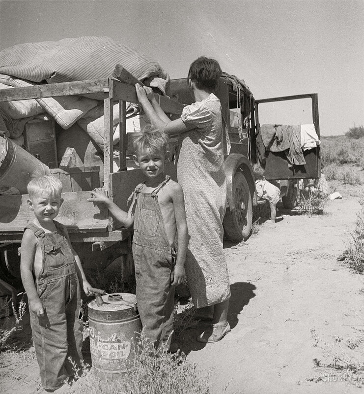 Family with truck in desert
