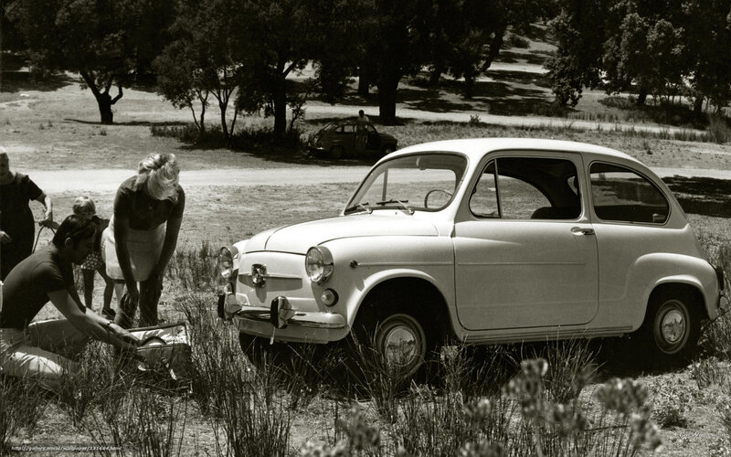 Family with vintage car