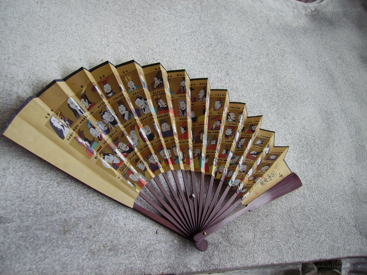 fan with historical figures