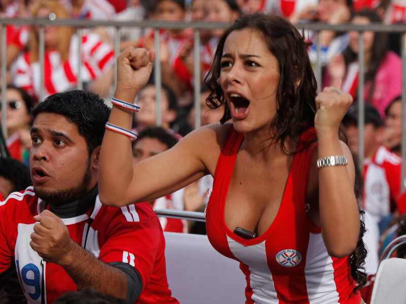 fans cheering at a soccer match