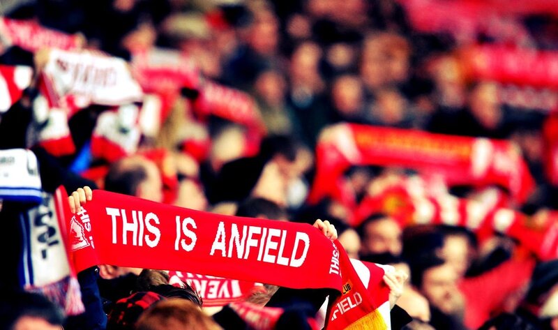 Fans Holding Scarves