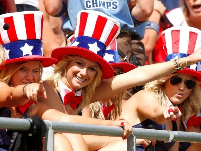 Fans in patriotic hats at event