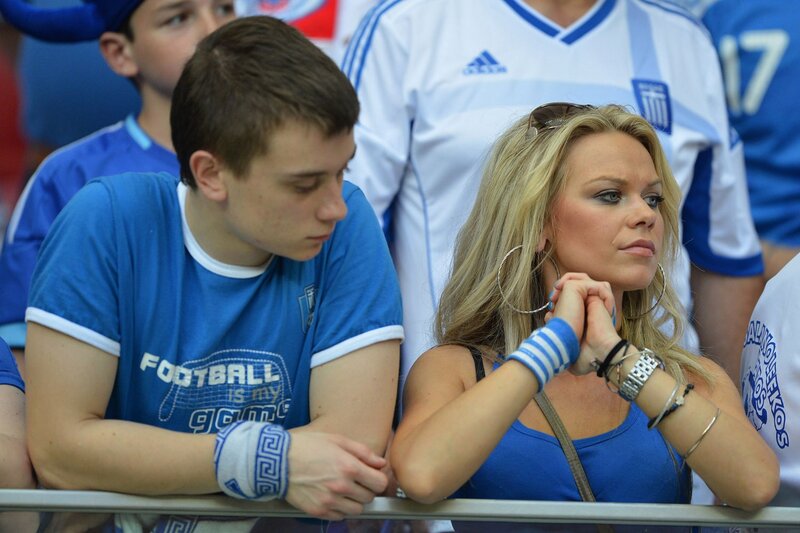 Fans watching a football match