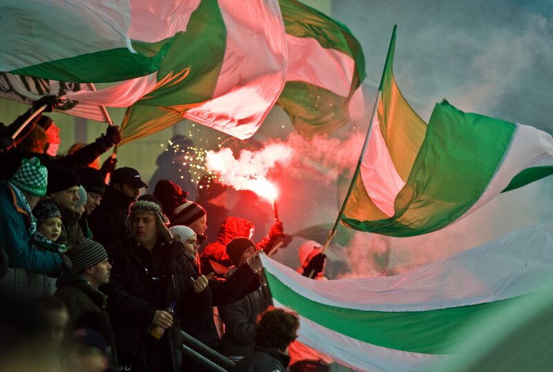Fans with flags and flares