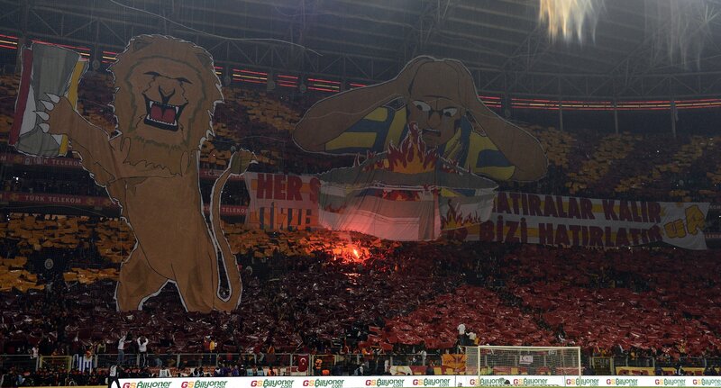 Fans with Large Banners — Red, Dramatic