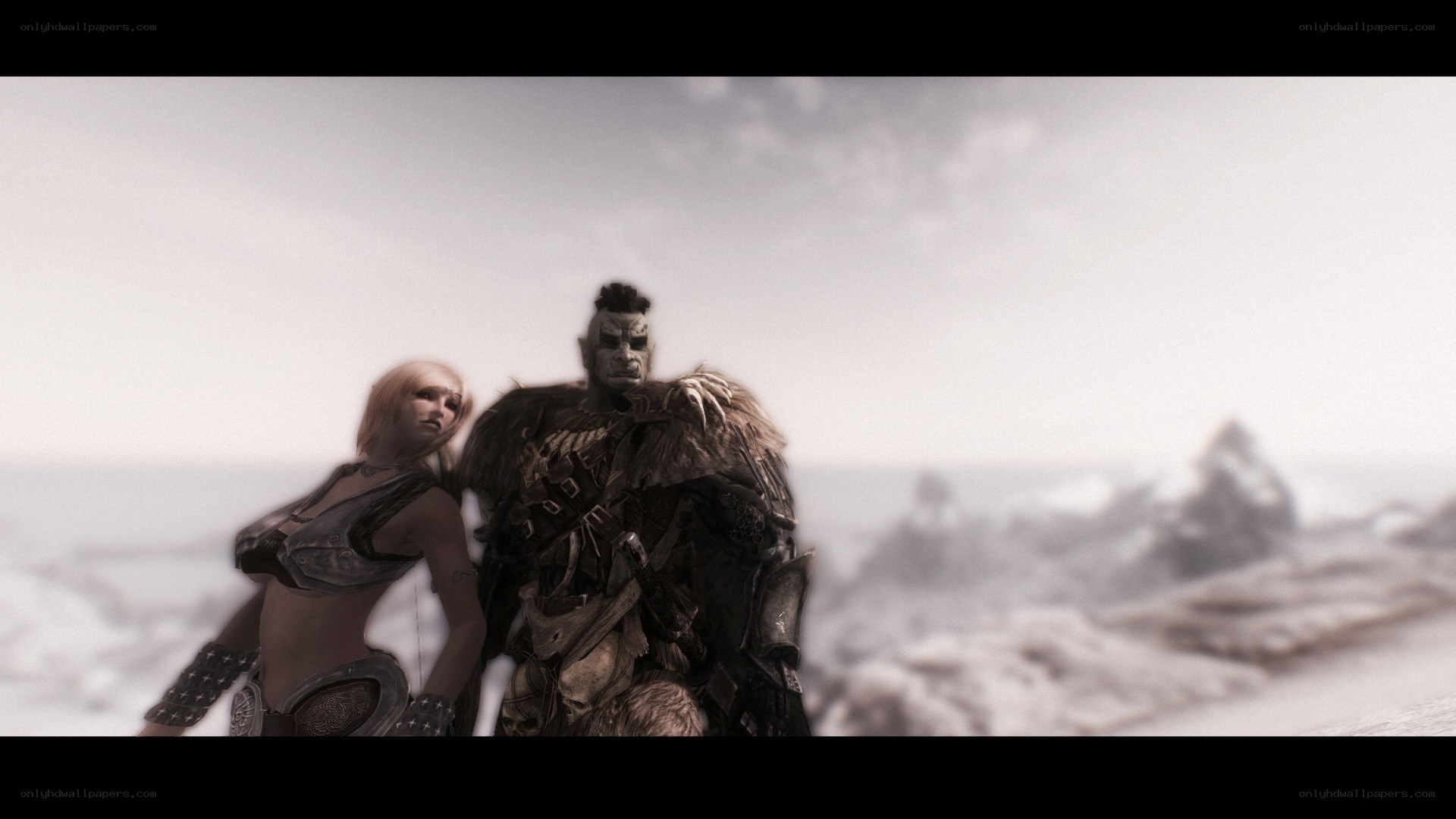fantasy characters in snowy landscape