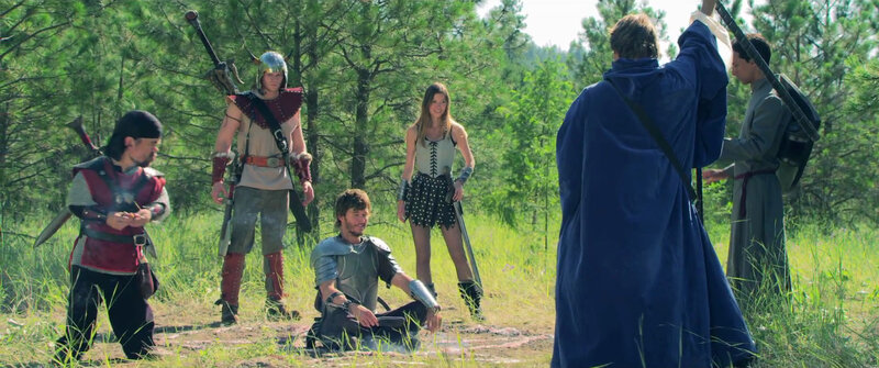 Fantasy role-playing group in forest