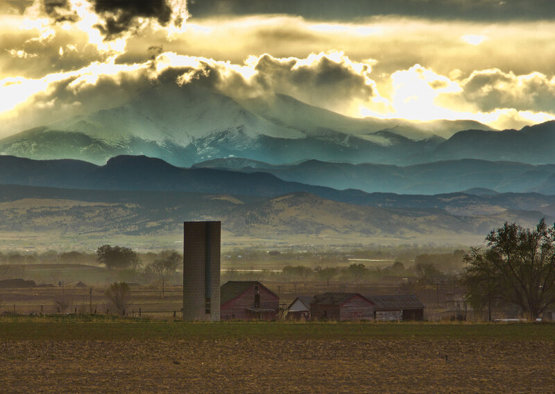 Farm Buildings with Mountain