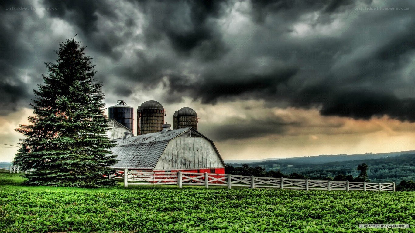 Farm under stormy sky