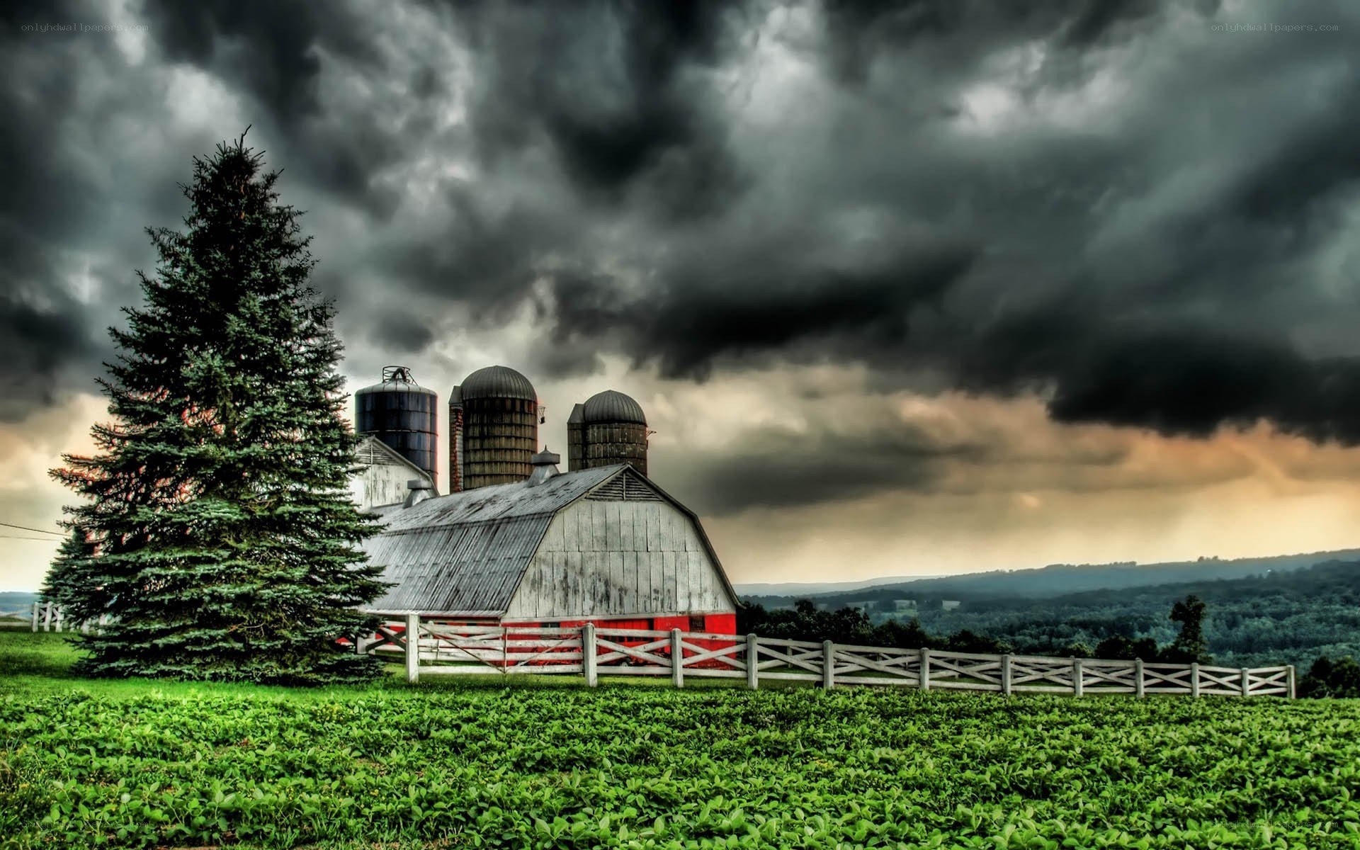 Farm under stormy sky