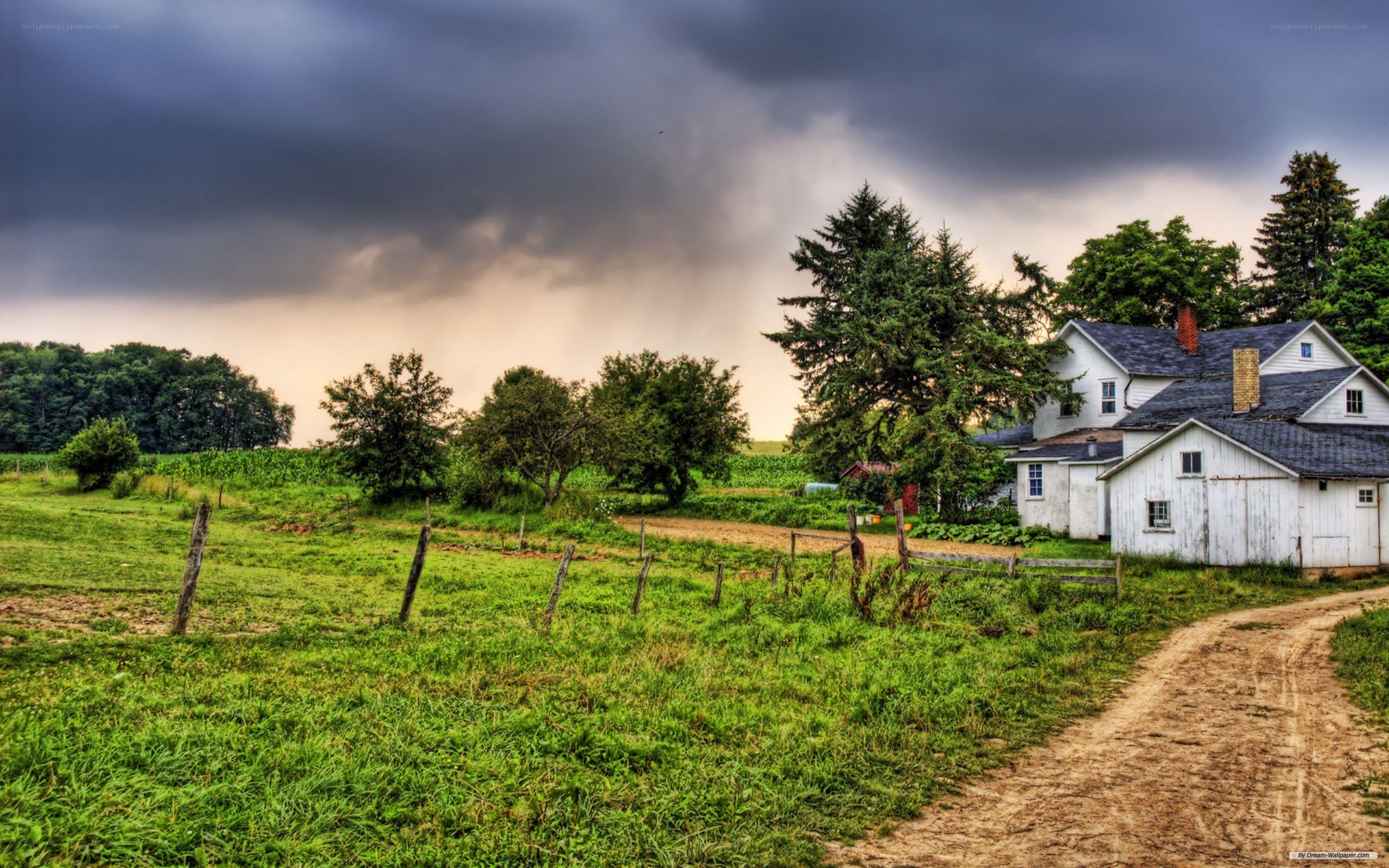 Farm under stormy sky
