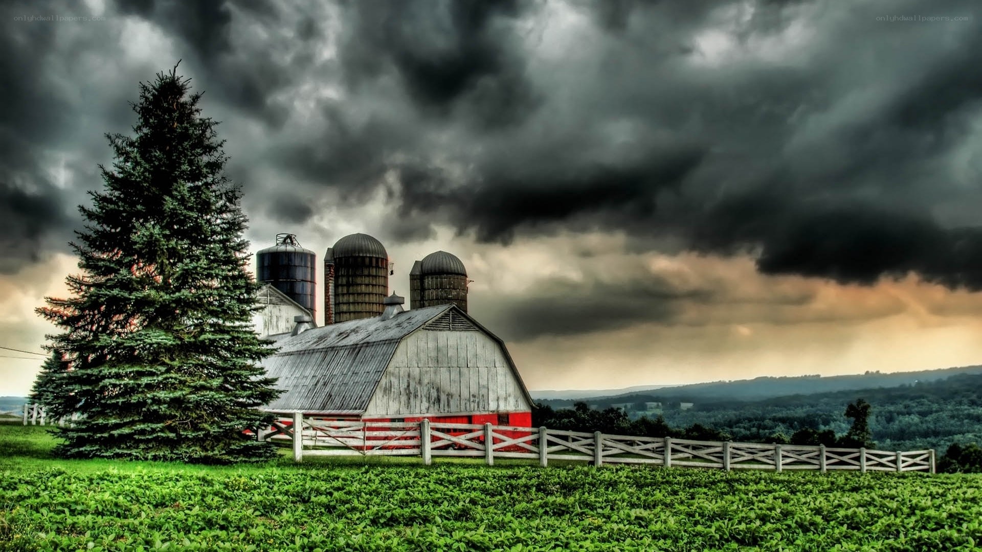 Farm under stormy sky
