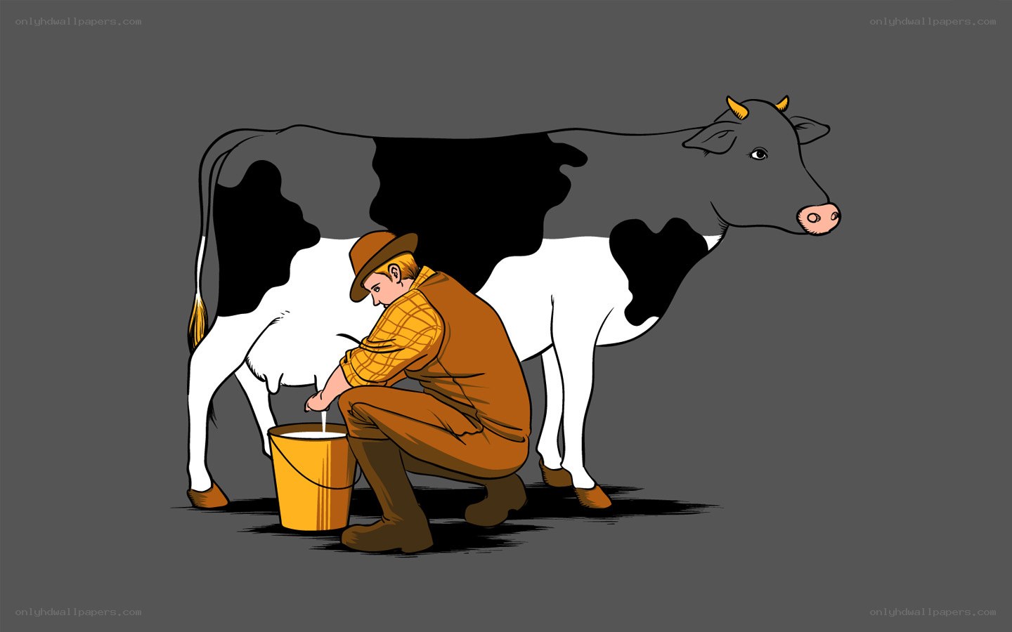 farmer milking a cow