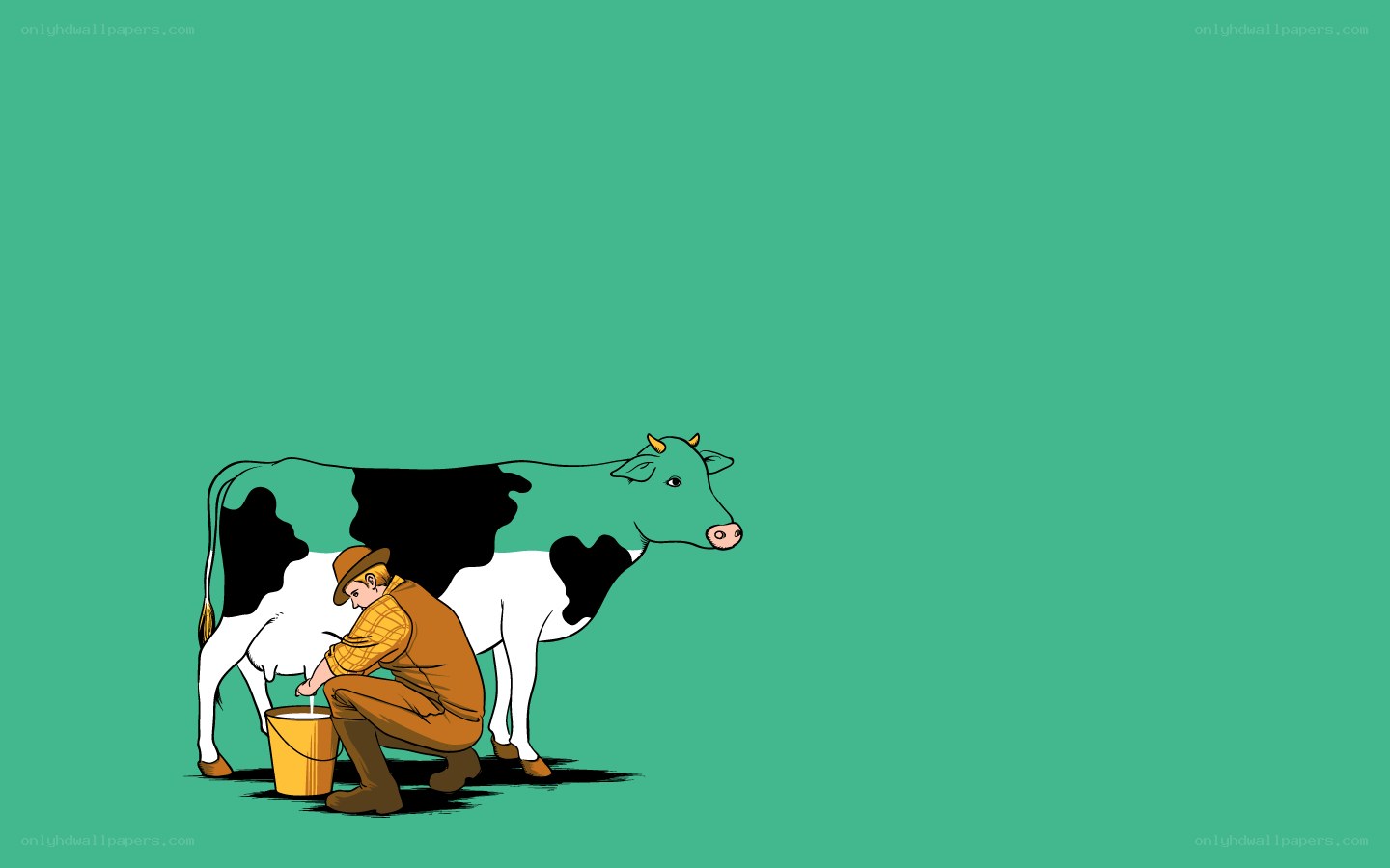farmer milking a cow