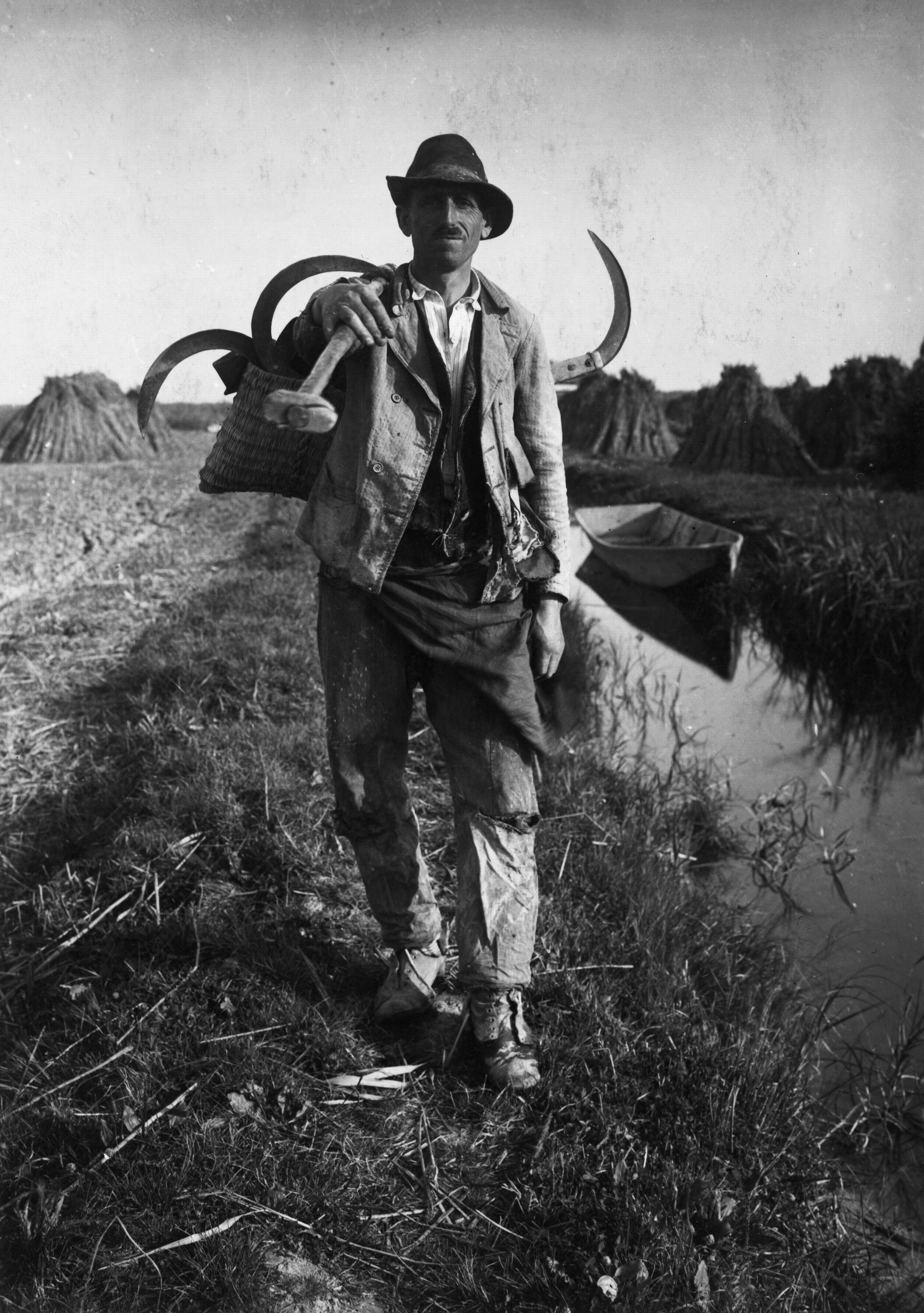 Farmer with scythe and basket