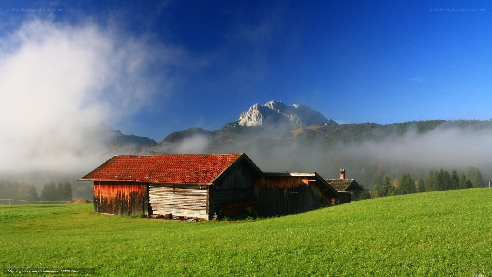 Farmhouse in mountain valley