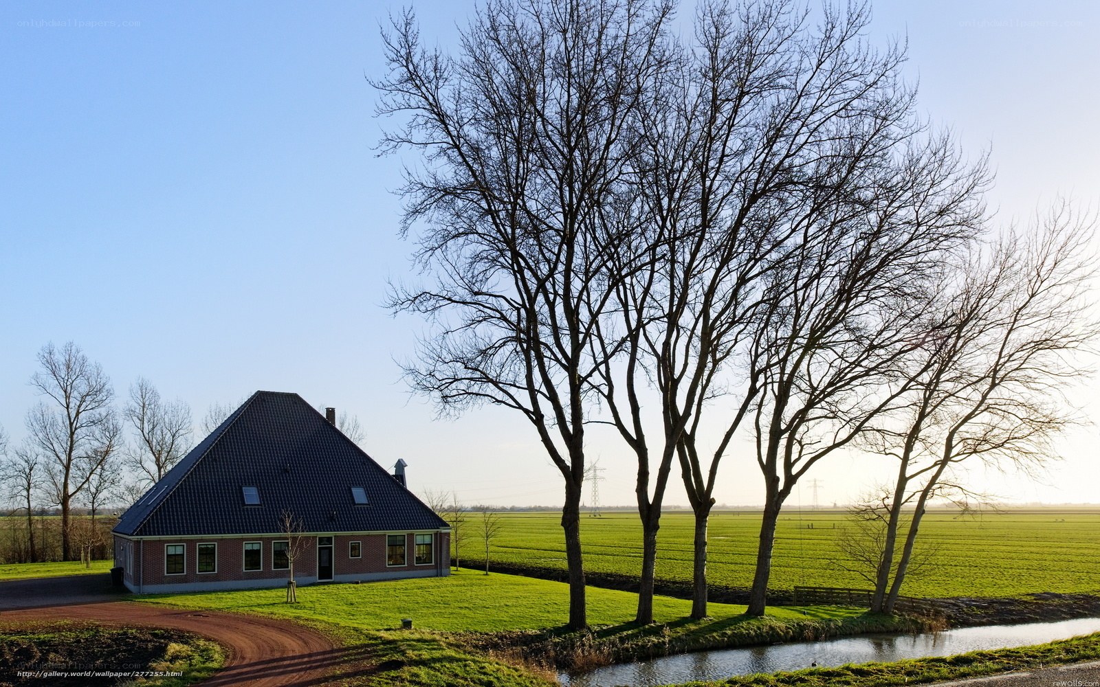 Farmhouse in rural landscape